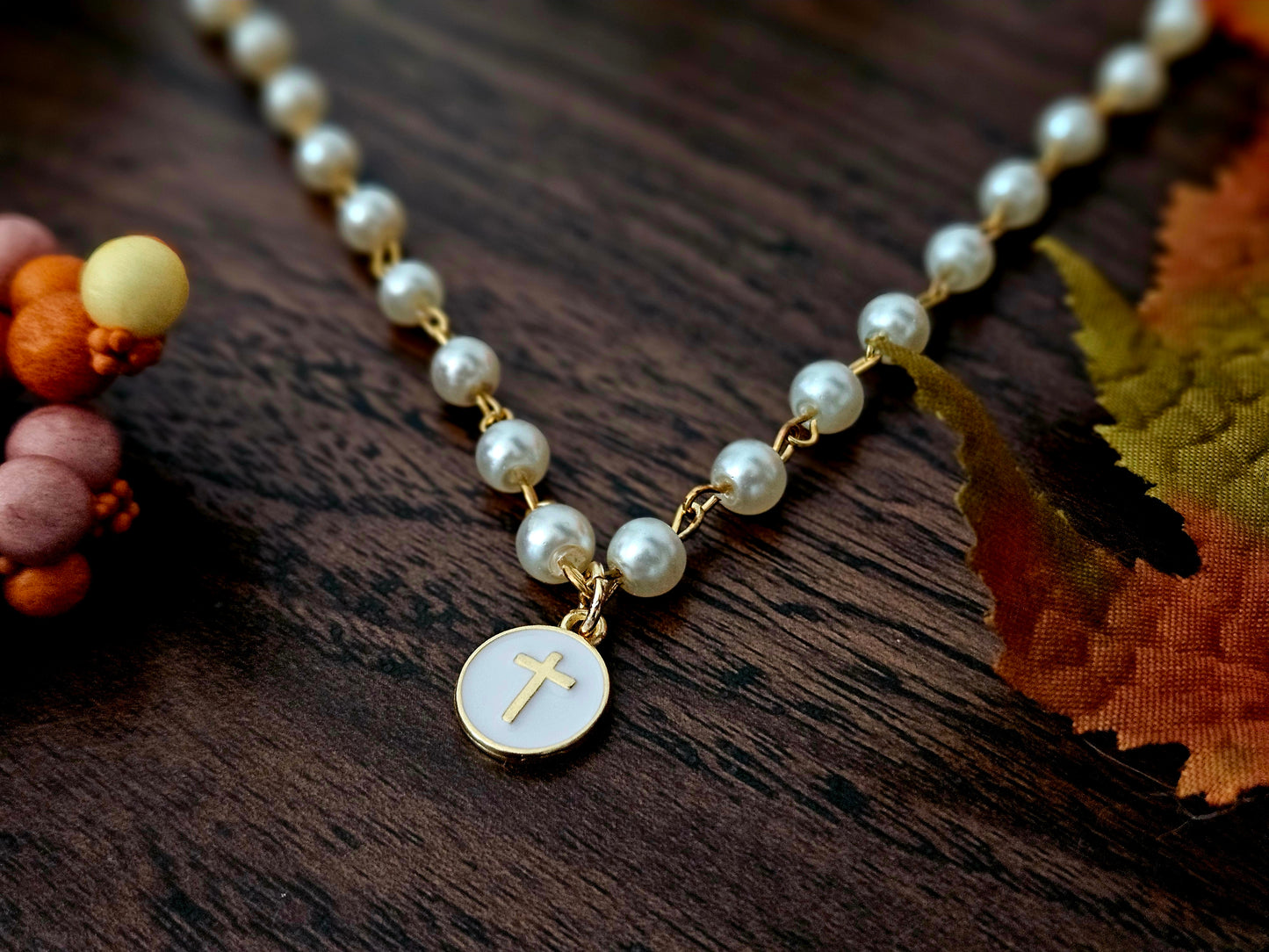 Gold & Pearlized Beaded Cross Charm Necklace